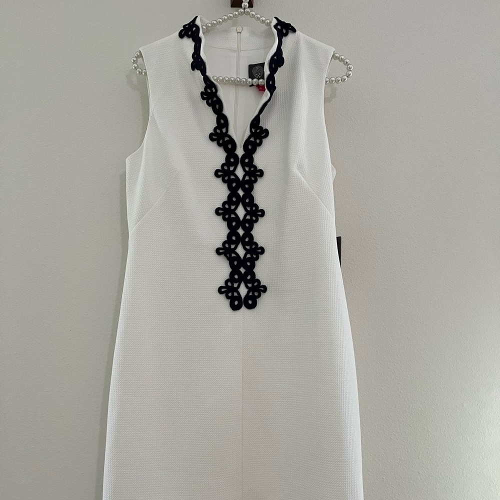 New with tags! Vince Camino dress in ivory with dark navy blue detail.